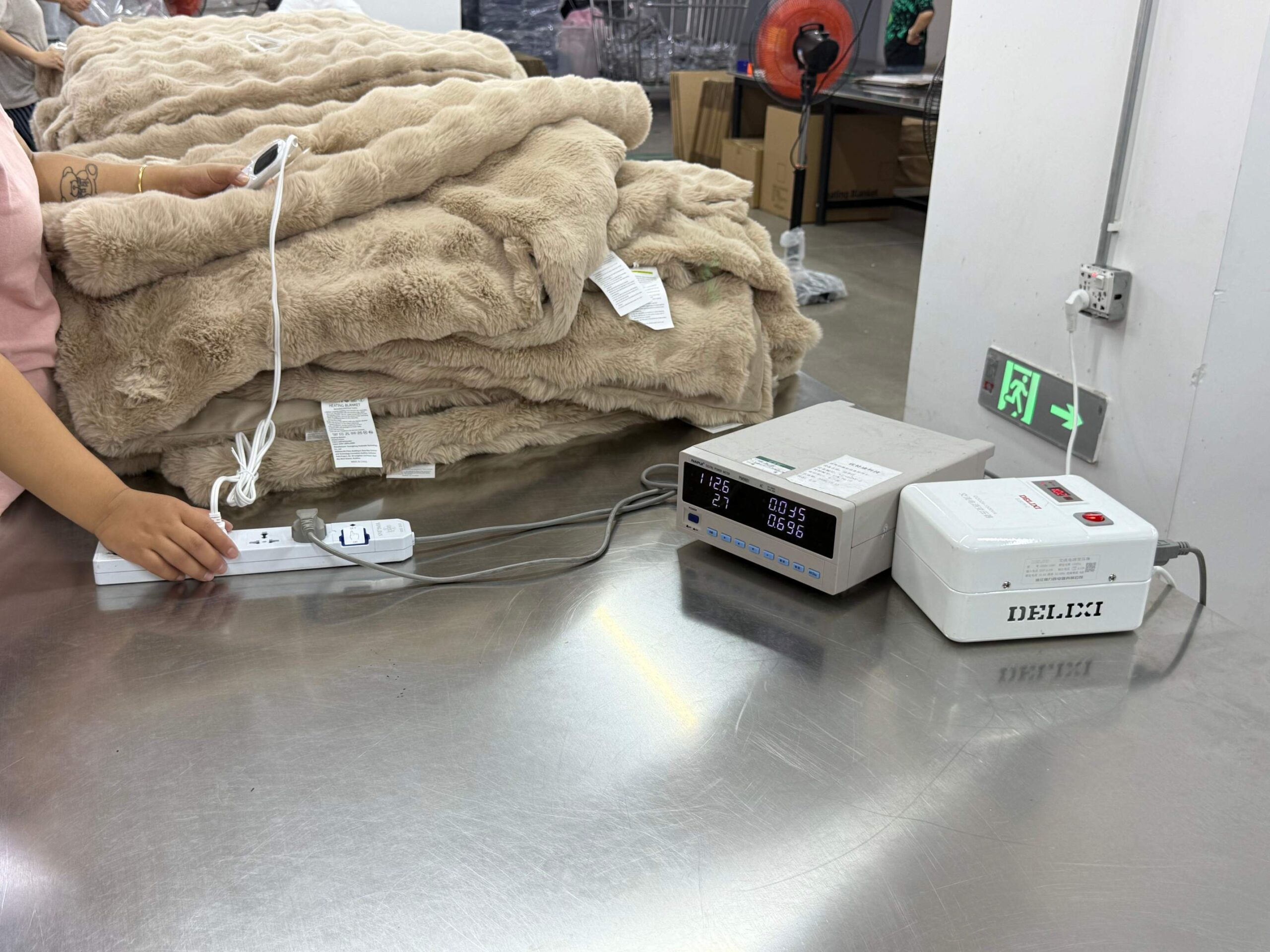Automated heating wire layout during OEM electric blanket production