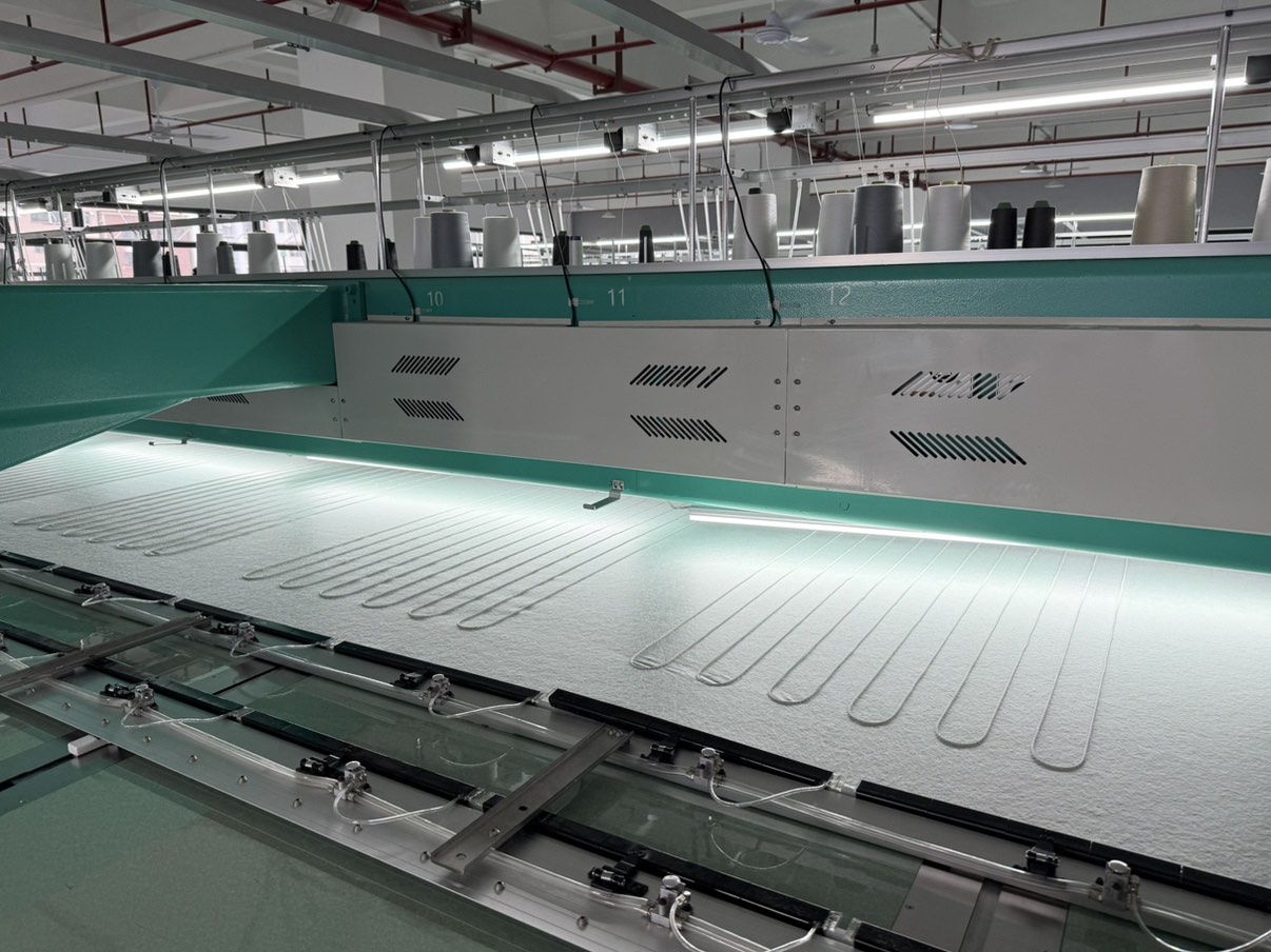 Automated heating wire layout during OEM electric blanket production