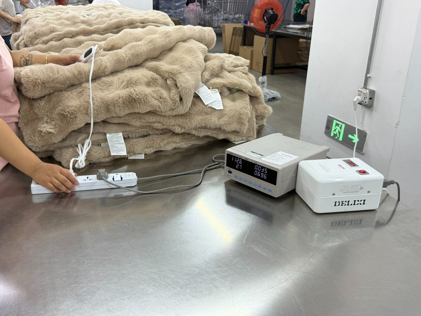 Electric Blanket Quality Control Testing Electric blanket quality control testing with power measurement equipment before shipment